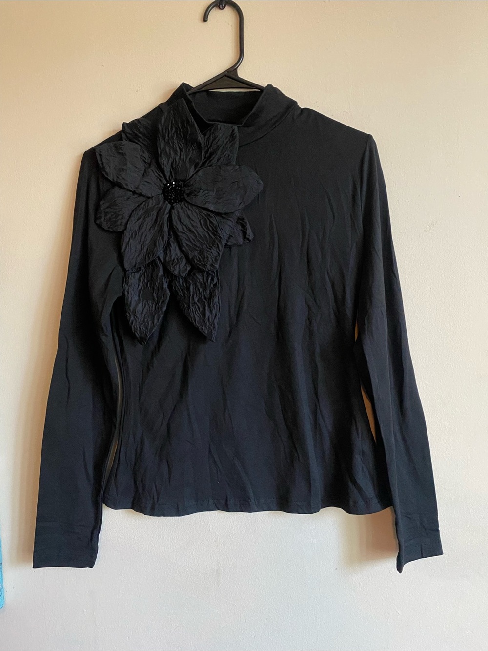 Black Long-Sleeve Top with Oversized Floral Accent